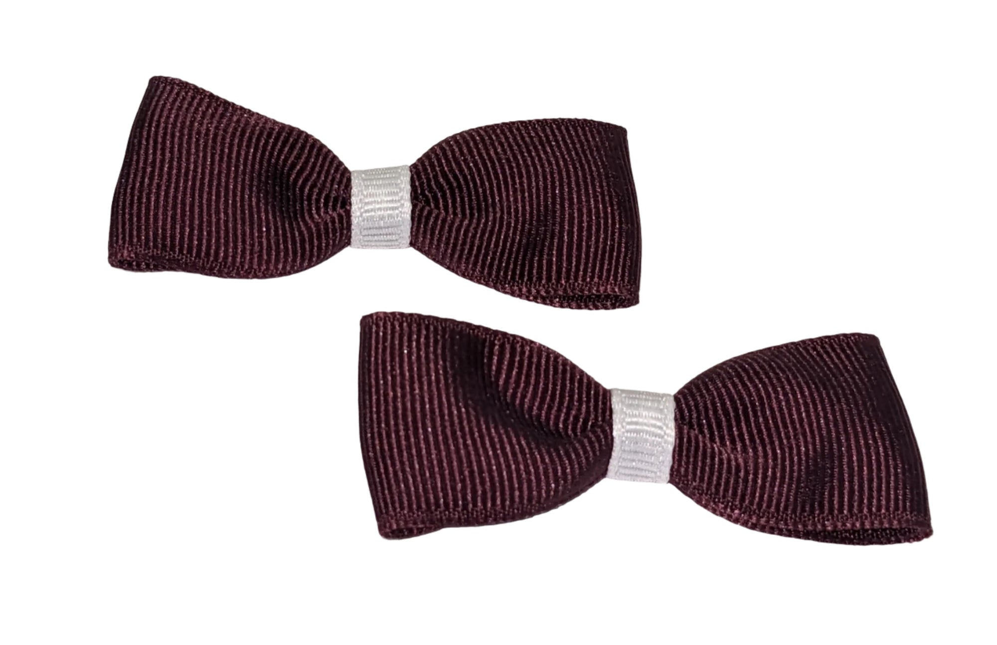 Two burgundy and white striped clip-on hair bows laid out flat.