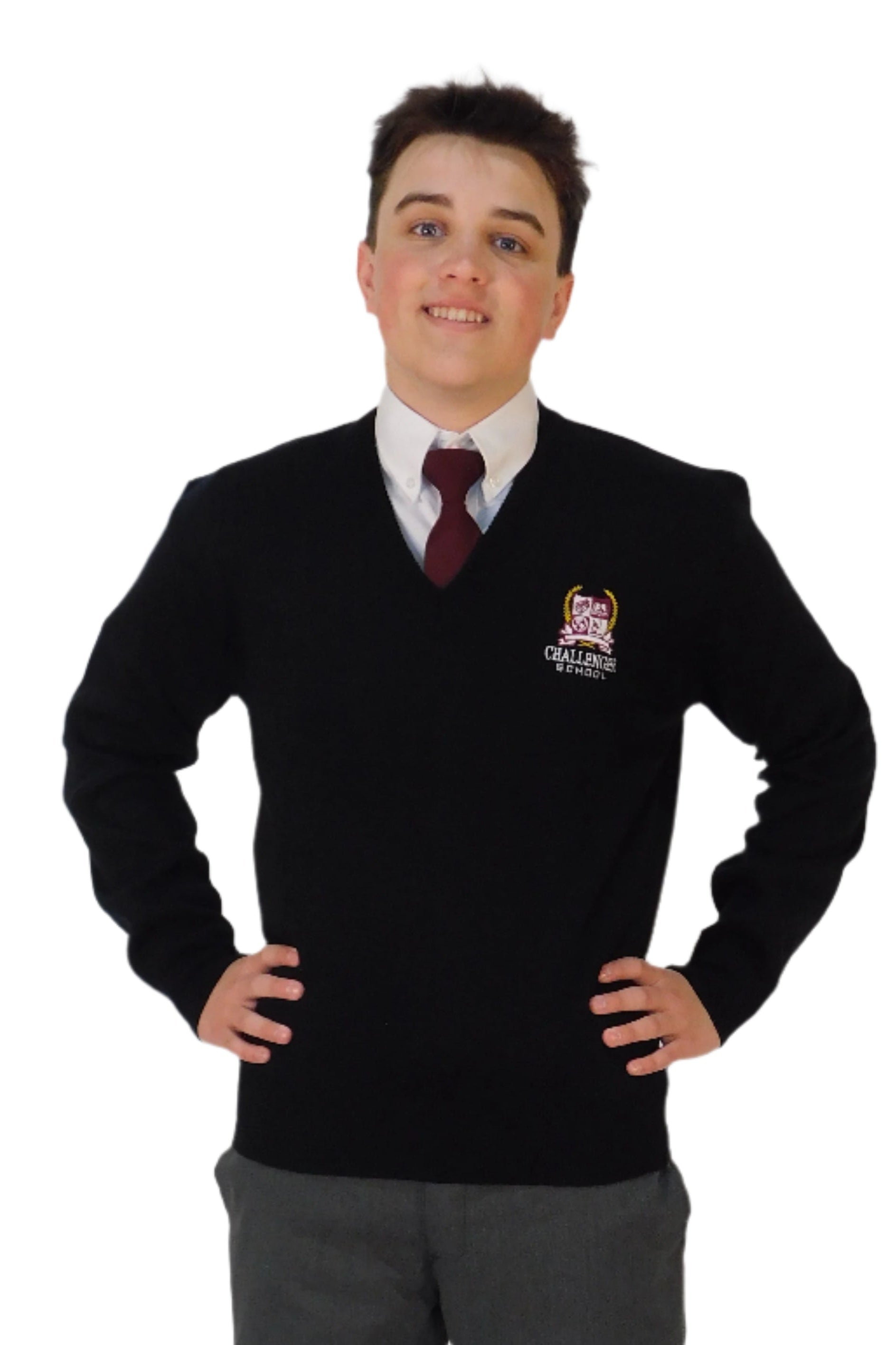 Person wearing a black sweater with a logo, gray pants, and a tie on a white background